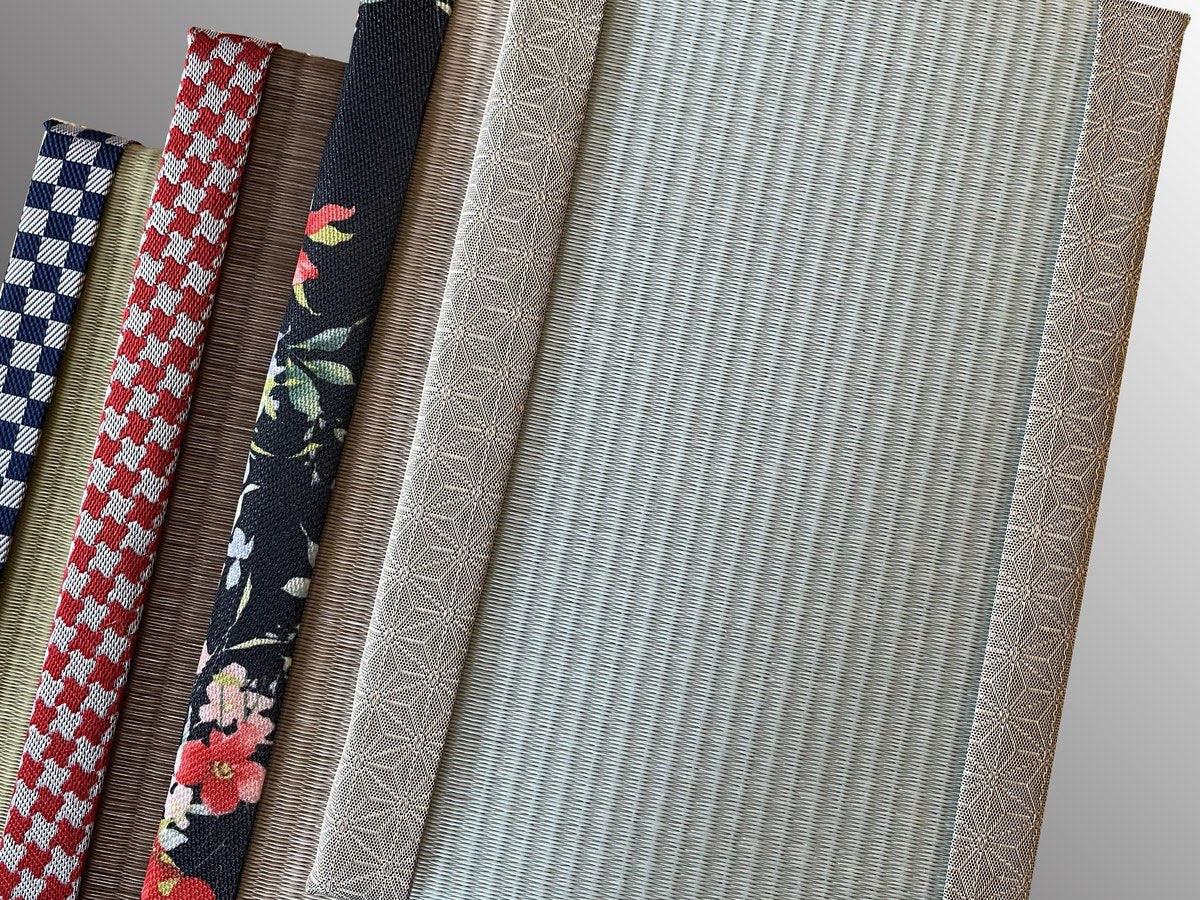 Small tatami mats with colorful tatami-beri bands along their edges